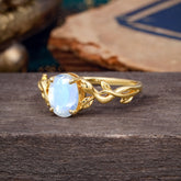 Nature-inspired Botanical Vine Entwined 4-Prong Oval-Cut Moonstone Engagement Ring